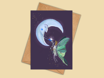 Luna Moth greeting card by Anna Seed: a green luna moth sharing a sparkle with a crescent moon, on deep purple
