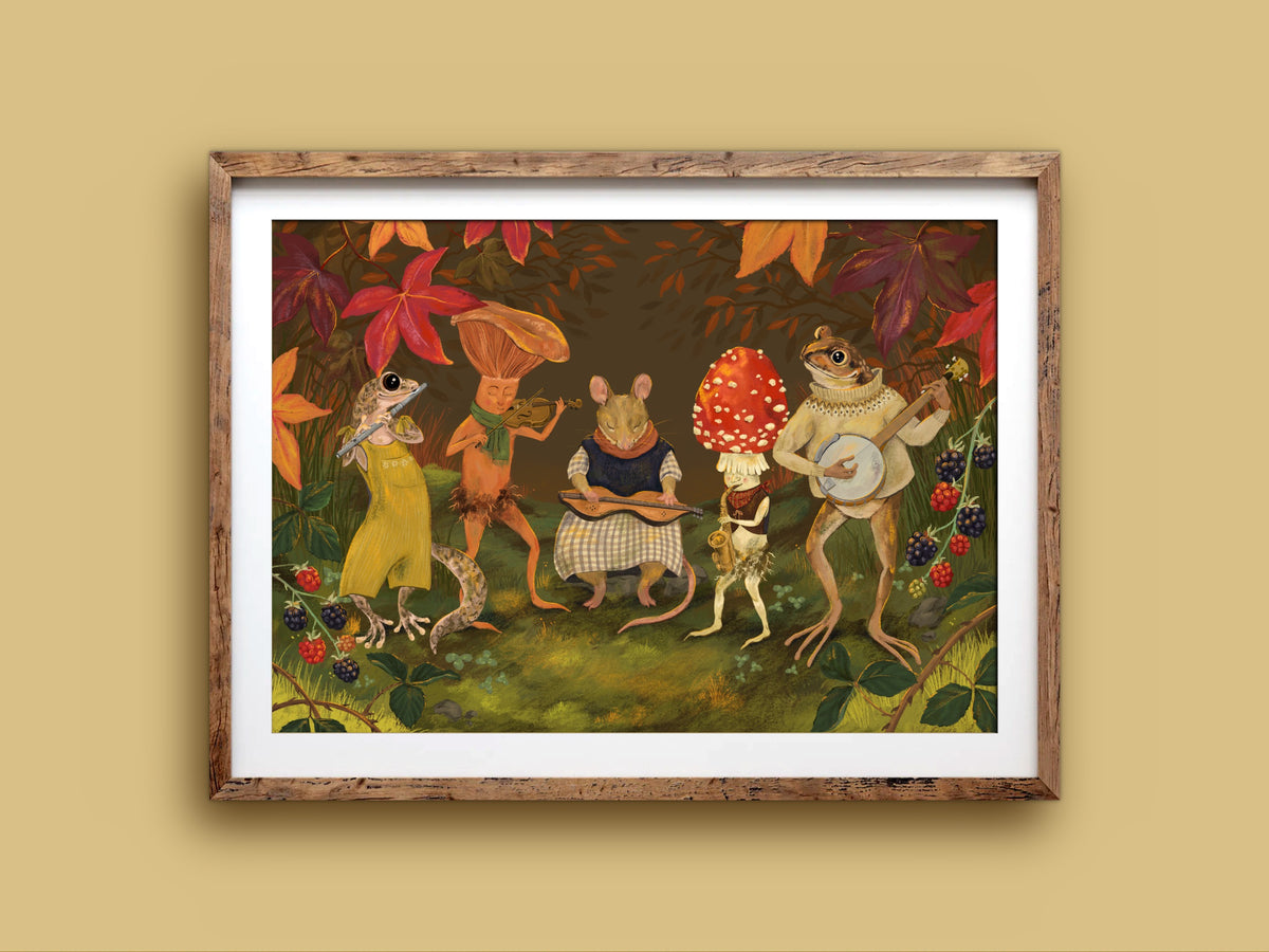 Autumn Jam art print in a wooden frame, woodland critters playing banjo, fiddle and dulcimer, on a mustard wall