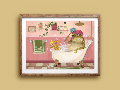 Bath Time art print in a wooden frame, a bubbly toad relaxing in a bath with a rubber duck, on a mustard wall