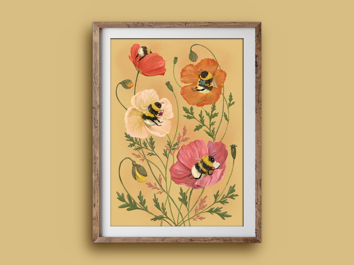 Bumblebee Bibliophiles art print in a wooden frame, bees snuggled with books in Icelandic poppies, on a mustard wall