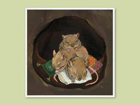 Cuddle Puddle art print by Anna Seed: three field mice asleep in a heap on cushions and blankets inside a dark, cosy burrow