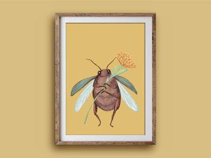 Cute Beetle print in a rustic wooden frame on a mustard wall, showing a winged beetle hugging a little orange flower