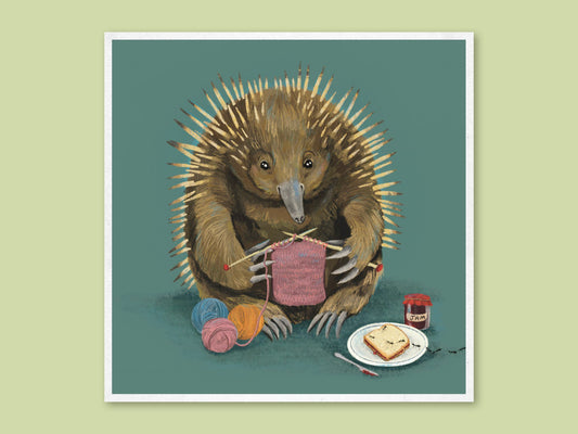 Knitting Needles art print by Anna Seed: an echidna knits a pink scarf beside balls of wool and jam on toast, on teal