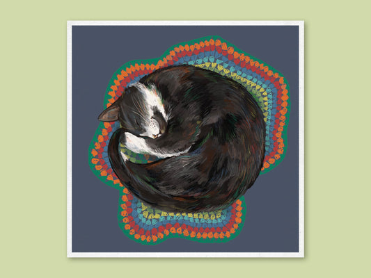 Schnoozle art print by Anna Seed: a tuxedo cat curled up asleep on a rainbow crochet rug against a slate-blue background