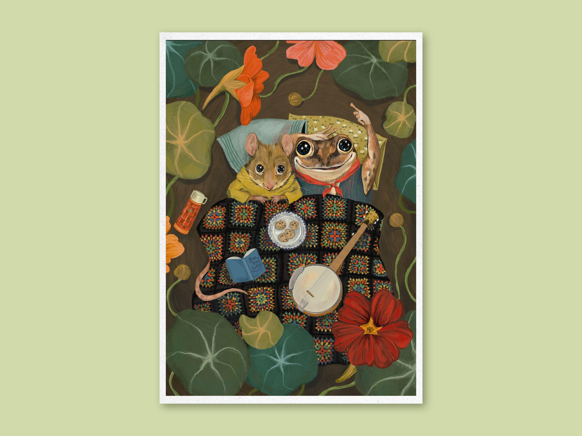 Starry Eyes art print by Anna Seed: a mouse and frog snuggle under a granny-square blanket among nasturtiums, on green