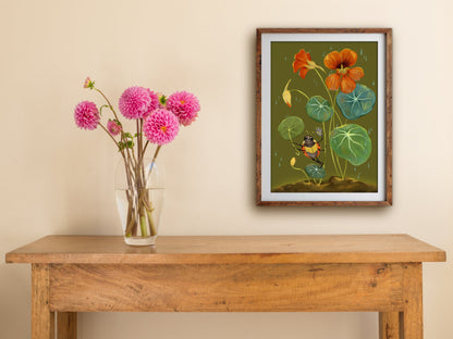 Framed Sunshower print hung above a wooden table with pink dahlias, showing the ladybird singing in the rain