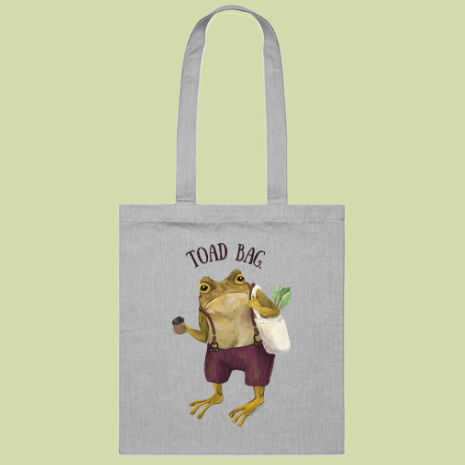 Grey Toad Bag tote mockup featuring Gustav the grumpy toad with a coffee and shopping bag, on a pale green backdrop