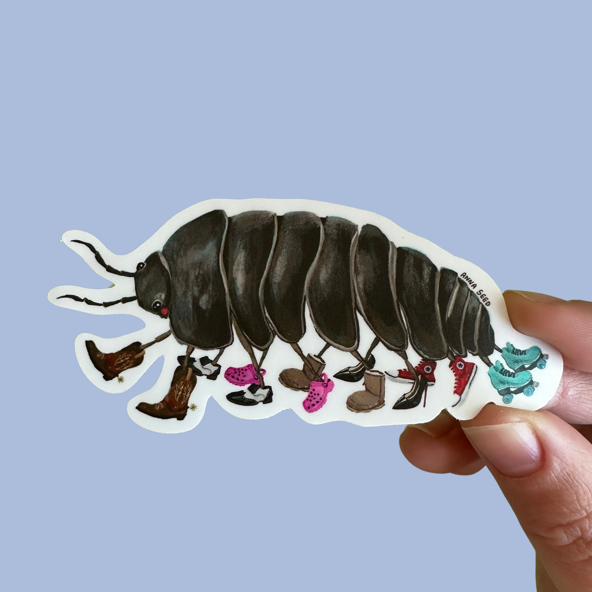 Roland the Roly Poly sticker by Anna Seed: a slater bug wearing mismatched boots, heels, sneakers and roller skates