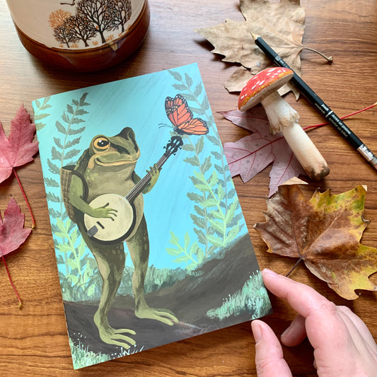 Anna Seed Art | Lined A5 Notebook - Banjo Frog. Cute Stationery